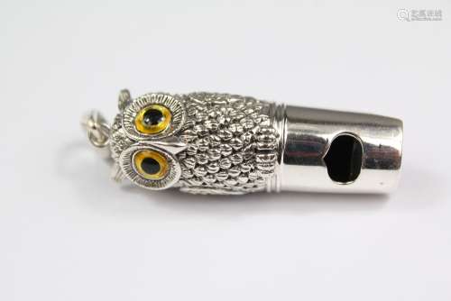 A Silver Whistle; the whistle modelled as an Owl, approx 18