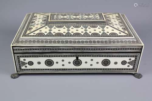 A 19th Century Indian Sadeli Mosaic Work Box: The box worked with a fine ivory, silver inlay, silver handles to the sides, on four paw feet, approx 32 x 23 x 10 cms