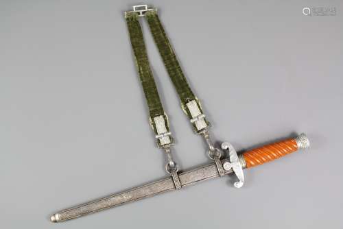 Mid-Ranking Army 'Heer' Officers Dress Dagger, plain blade with Puma stamp, with amber-coloured ivorine grip, aluminium fittings complete with silvered suspension straps etched H