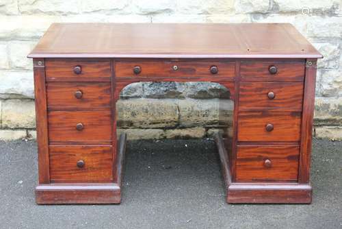 A Late Victorian Twin-Pedestal Mahogany Desk,  the desk having two short and one long drawer to top and six other drawers, tooled leather scriber, with lockable panels, approx 81 x 133 x 77 cms, pedestal base