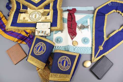 South Wales Western Division Masonic Regalia; including silver-gilt jewels, aprons, gauntlets and robes, gloves etc