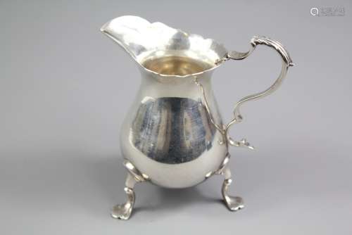 A Silver Cream Jug; Chester hallmark, dated 1937, stamped Lowe, approx 110 gms