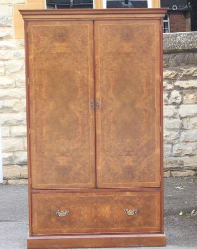 A Bespoke Walnut and Mahogany Inlaid Wardrobe; the wardrobe having burr lined interior with three shelves and drop front blanket drawer under, approx 118 x 51 x 210 cms