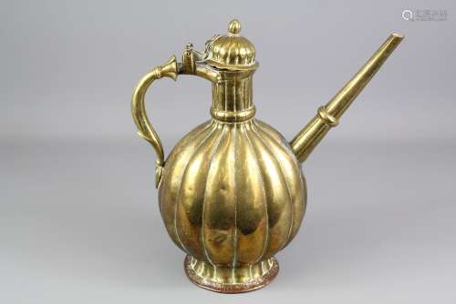 An 18th Century Moghul Melon Form Ewer; the ewer being approx 28 cms h