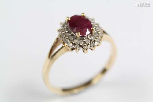 A Vintage 9ct Ruby and Diamond Ring, the oval ruby approx 7 x 5 mm, size P, approx 2