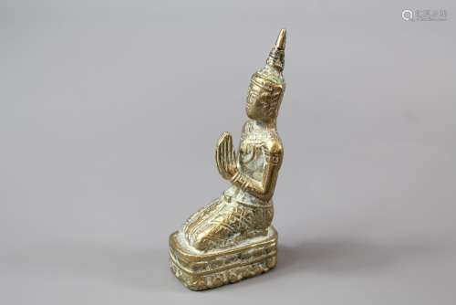 A South Asian Brass Miniature Figure of Buddha, approx 10 cms h, depicted seated in contemplative pose
