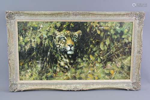 Tony Forrest Wildlife Artist - Original Oil on Canvas, 'Leopard in the Undergrowth', signed lower right; approx 76 x 40 cms Note: Purchased from the Gun Street Gallery, 14 Gun Street, Reading in 1994