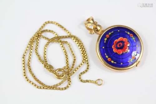 An 18ct Yellow Gold and Enamel Locket Pendant, on a 18ct gold chain approx 33 cms, the circular locket approx 22 mm, approx 11 gms