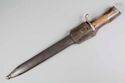 A German WWI Era Mauser Butchers Bayonet, with saw back, factory marks Waffenfabrick Mauser A