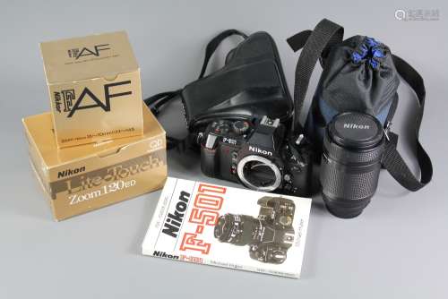 A F-501 AF Nikon Camera; with a Nikon Zoom lens 70-210 mm f4-f5