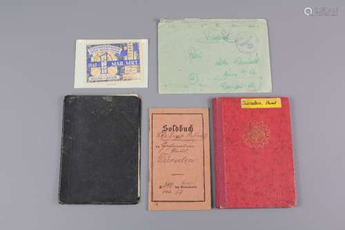 Miscellaneous German WWII Era ID Documents, including a Nazi-era passport, Nazi pay book, three hand-written German letters from the field bearing stamps, serving soldiers pay book and a 1945 Petrol Rationing-Coupon