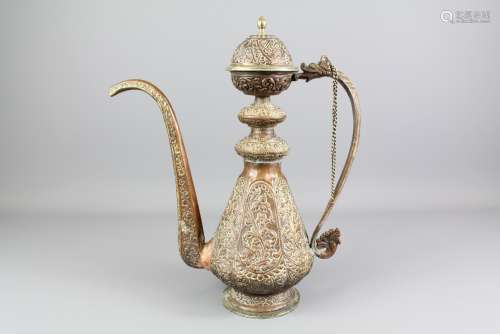A 19th Century Tibetan Copper Ewer; the ewer with dragon form handle - traces of gilding - approx 35 cms