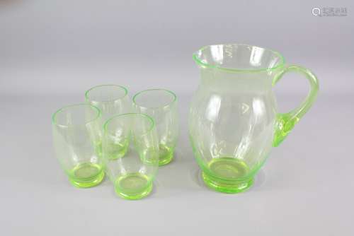 Green Glass Lemonade Jug with four tumblers, jug approx 20 cms h, tumblers approx 11 cms h