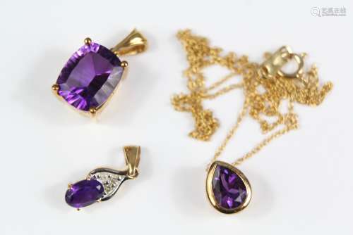 Two 9ct Yellow Gold Amethyst Pendants, the first 10 x 8mm and the other 5 x 3 mm, approx 2