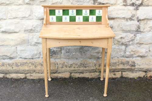 A Pine Wash-stand; the wash-stand having balcony and set with green and Arts & Crafts tiles, approx 31 x 17 x 29 cms