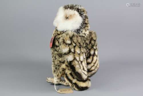 A Steiff Studio Mohair Owl; the owl bears a button on his wing nr 2593/28, glass eyes, approx 30 cms h