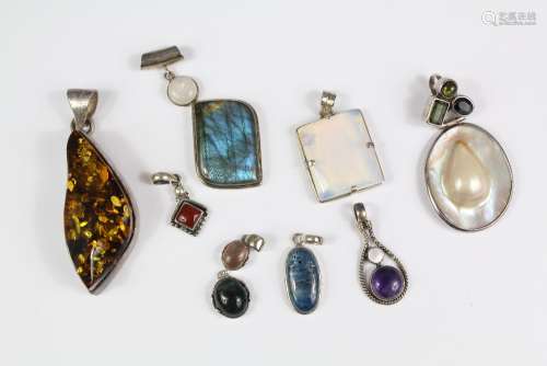 Collection of Semi-Precious Stone and Other Pendants in silver mounts, including Pearl, Quartz etc (8)