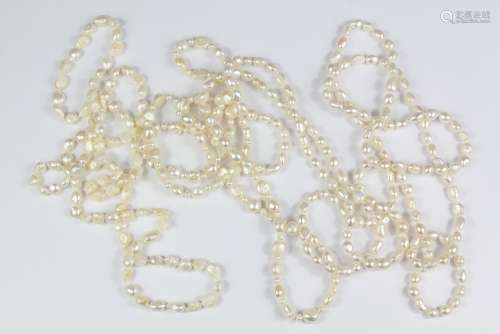 Three White Fresh Water Baroque Pearl Necklaces: pearls approx 5 - 10 mm, approx 100 cms and one approx 116 cms