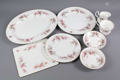 Royal Albert 'Lavender Rose' Part Dinner & Tea Service; the service comprises nine teacups, nine saucers, fourteen tea plates, ten dessert bowls, twelve place mats, twelve dinner plates, ten fish plates, gravy boat and saucer, oval meat platter approx 35 x 28 cms