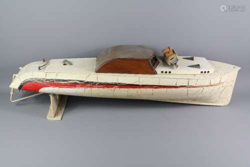 A Vintage 'Steam' Pond Speedboat; the speedboat rests on a stand, approx 93 x 23 x 26 cms, a wonderful restoration project