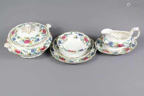 A Booths 'Floradora' A8042 Part Dinner Service; the service includes six dinner plates, four fish plates, six soup plates, four salad bowls, six dessert bowls, two lidded servers, one sauce boat and saucer, one meat platter approx 33 cms