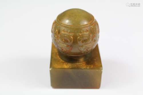 A Chinese Jade Stamp, with rounded grip, approx 6 cms h