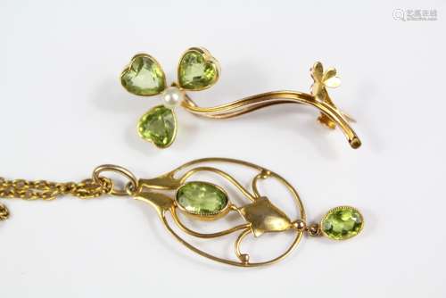 An Antique 14ct Gold Peridot and Seed Pearl Floral Brooch, together with a 9ct yellow gold peridot pendant suspended from a 14ct gold chain, approx 8