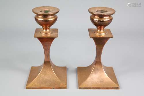 A Pair of Arts & Crafts Copper Candlesticks: the candlesticks approx 17 cms h