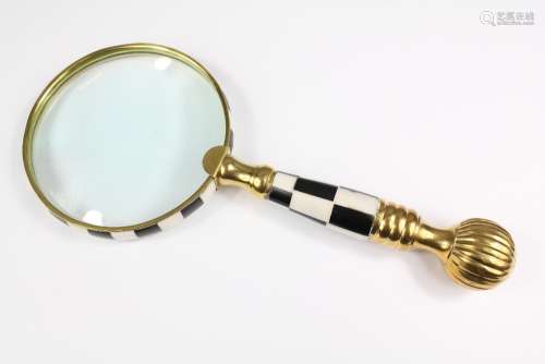 A Large Brass Hand-held Magnifying Glass