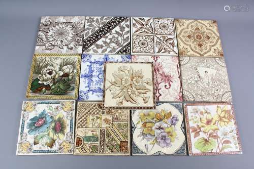 Thirteen Victorian Ceramic Tiles, some monochrome and some polychrome of foliate design