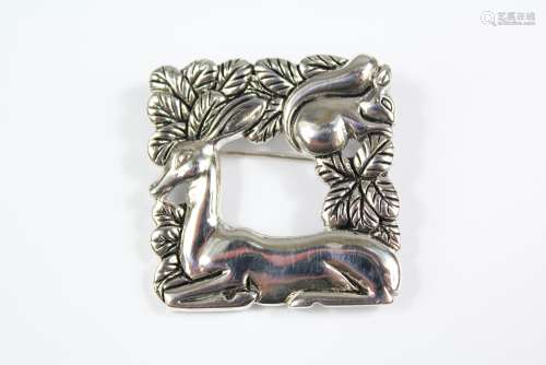 A Silver Norwegian-style Brooch; the brooch depicting animals, approx 35 x 35 mm, approx 13