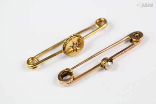 An Antique 9ct Yellow Gold Stick Pin, set with a rose-cut diamond, approx 4 cms l together with another 9ct gold stick pin set with a seed pearl approx 4 cms, combined weight 5 gms