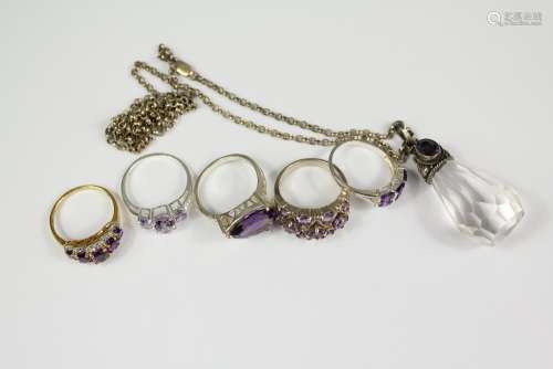 Five Silver and Amethyst Rings, various sizes together with a cut-glass and amethyst pendant and chain