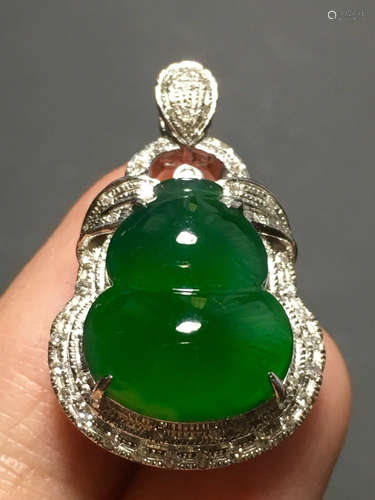 A ICY GREEN JADEITE CARVED GOURD PENDANT , TYPE A