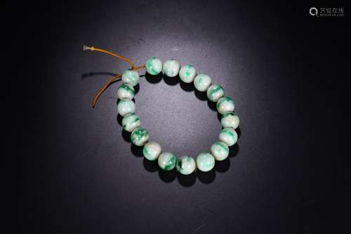 A GREEN JADEITE BRACELET