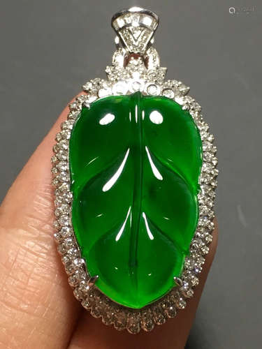 A ICY GREEN JADEITE CARVED LEAF PENDANT , TYPE A