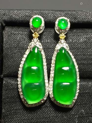 A PAIR OF GREEN JADEITE CARVED BEAN EARDROPS