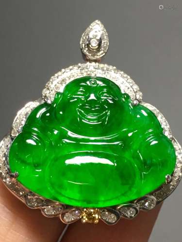 A GREEN JADEITE BUDDHA FIGURE DENPANT