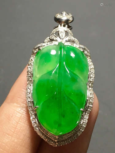 A ICY GREEN JADEITE CARVED LEAF PENDANT , TYPE A