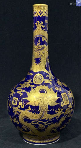 A QIANLONG MARK FIVE DRAGONS PATTERN SACRIFICE BLUE OUTLINE IN GOLD VASE