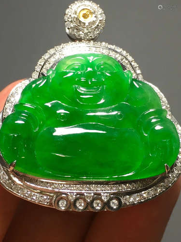 A ICY GREEN JADEITE CARVED ”FOGONG