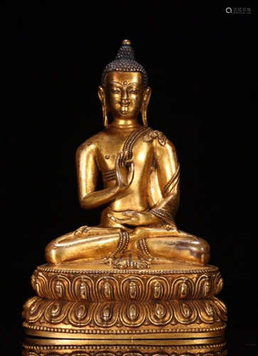 A GILT BRONZE BUDDHA