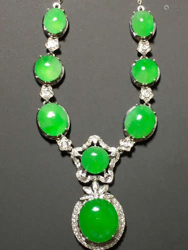 A ICY GREEN JADEITE CARVED CIRCLE  NECKLACE , TYPE A