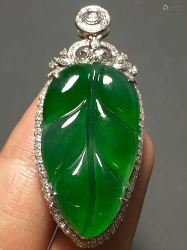 A ICY GREEN JADEITE CARVED LEAF PENDANT , TYPE A