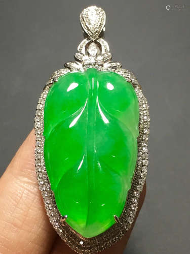 A ICY GREEN JADEITE CARVED LEAF PENDANT , TYPE A