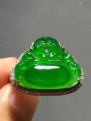 A ICY GREEN JADEITE CARVED ”FOGONG