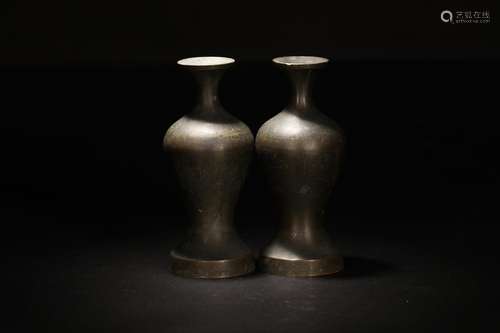 A PAIR OF BRONZE VASES