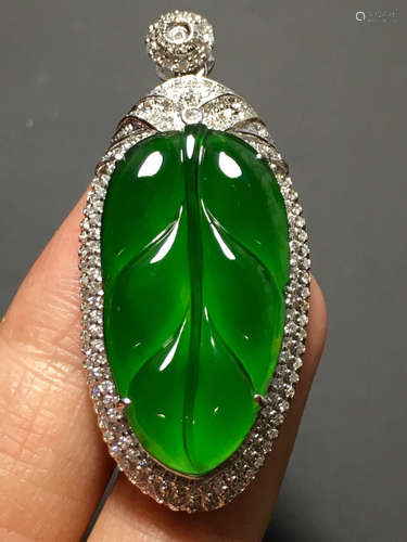 A ICY GREEN JADEITE CARVED LEAF PENDANT , TYPE A