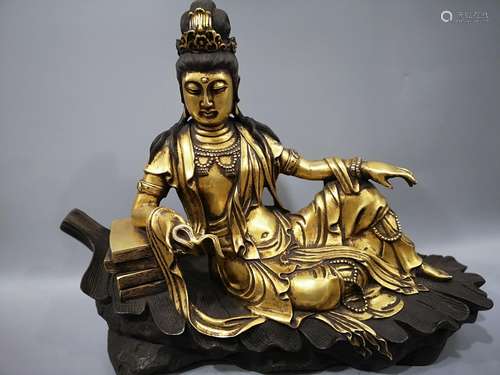 A PUEPLE COPPER WITH GILT BRONZE 'BAOJIAO GUANYIN' BUDDHA