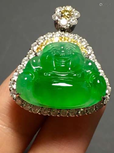 A GREEN JADEITE BUDDHA FIGURE DENPANT